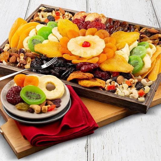 This impressive Artful Dried Fruit and Nut gift tray is as pleasing to the eye as it is to the palate! Artfully arranged inside a beautiful Tung Tree 14"x10"x1.5" wood tray are 38 ounces of premium nuts and extra fancy dried fruits. Boasting an assortment of dried fruits, including apple rings, California Angelino plums, Glace cherries, and more! This exquisite gift is impossible to resist.