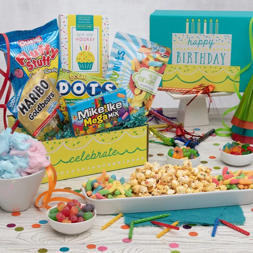 When you can't be there for the party, send the party to them with this Birthday Festivities Gift Box! Treats? Check. Snacks? Check. We've got all your birthday bases covered, so no matter their age, they'll be ecstatic when the party is shipped to them in this perfect birthday-themed box!