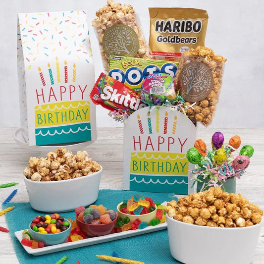 We have the perfect Birthday Wishes Treats and Sweets Gift Box for you to send their way. Our gourmet gift designers selected the most popular movie snacks and packaged them in a festive and fun box exploding with Happy Birthday Wishes! A nice bonus feature to this gift, a couple of the candies are the newer trending versions featuring sour flavors like the Sour Dots and the Sweet and Sour Tootsie pops. The gift also comes with our freshly popped popcorn in two flavors, which are absolutely delicious.