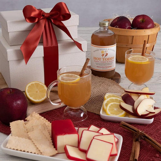 Warm hearts and indulge taste buds with our Care and Comfort Cheese Gift Tower. This delightful gift combines the soothing warmth and rich flavors of a classic hot toddy with a curated assortment of fresh fruit and cheese.