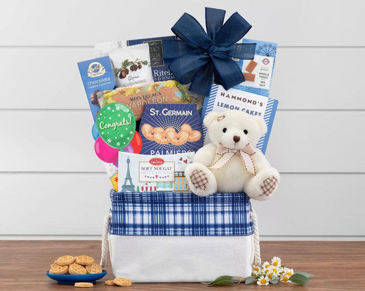 Congratulations Huggy Bear Gift Basket: Congratulate someone on a special achievement! A charming bear with your Congratulations message arrives with cranberry sesame cookies, Hammond's lemon cakes, Vanilla fudge with sea salt, Grona chocolate filled puff pastries and more to convey your feelings to family and friends, clients and co-workers.