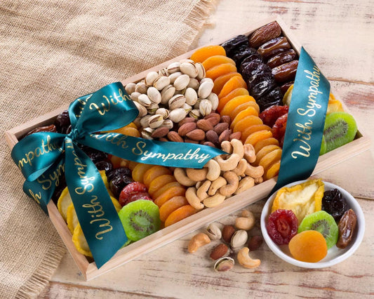 Dried Fruit and Nut Sampler Sympathy Gift Collection: Show them how much you care with this sympathy dried fruit and nut sampler. This pairing of freshly roasted salted nuts and delicately sweet dried fruit includes pistachios, almonds and jumbo cashews.