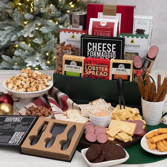Your recipient will enjoy decadent lobster spread on crispy artisan crackers, an assortment of creamy, delicious cheeses, savory sausage, freshly popped popcorn, and more. One of our favorites is the Snickerdoodle glazed almonds, which bring home the season's spirit.  The gift features a gourmet cheese knife set, perfect for slicing through cheese and spreading dips on all of the delicious gourmet snacks. Family and friends will rejoice when they receive the Elves' Favorite Christmas Gift Basket.   