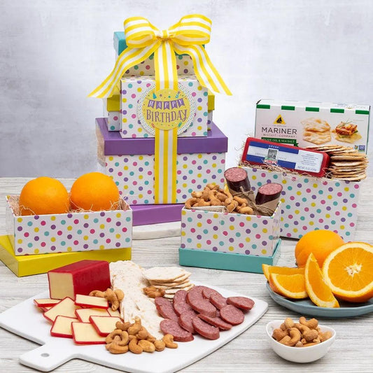 Need a Birthday Gift that is festive and filled with delicious snacks? This Fruitful Gourmet Birthday Gift Tower is just the right gift delivery! The polka-dotted tower is filled with orchard-fresh oranges, summer sausage, olive oil & sea salt water crackers, Vermont sharp cheddar cheese, creamy & rich wafer cookies, and roas