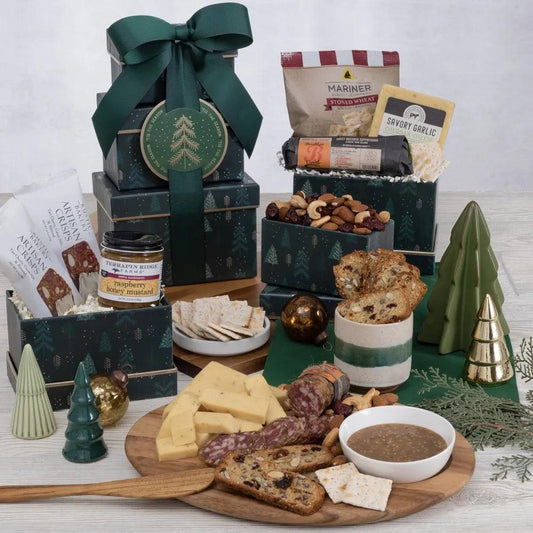 Unwrap the magic of the holiday season with our exquisite Holiday Meat and Greet Gift Tower, filled with an assortment of indulgent delights.  Inside three beautifully designed tower boxes, your friends and family will find a delightful combination of artisan crisps, creamy cheese, savory sausage, and delicious almond cashew cranberry mix, complemented by the lovely tang of raspberry honey mustard.
