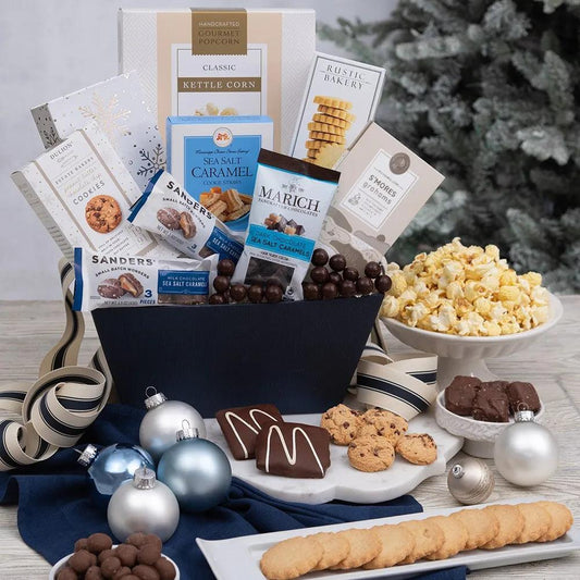Send a cozy holiday-inspired hug with our Holiday Spirit of Sweets Gift Basket! Packed with yummy cookies, mouthwatering milk chocolate sea salt caramels, freshly popped popcorn, and a charming keepsake box, this delightful assortment is a surefire way to share joy and the holiday spirit. 