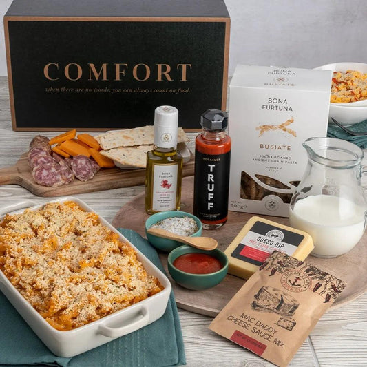  Chef-designed, this gift will deliver a little slice of heaven in a box with macaroni, three kinds of cheese, black truffle hot sauce, garlic-infused olive oil, organic crackers, garlic salt, and savory salami. The instructions are easy to follow, resulting in a jaw-droppingly delicious gourmet Mac and Cheese that soothes the soul through the belly!
