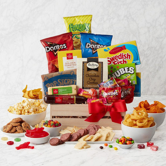 Movie Night Gathering Gift Crate - Send a gift full of snacks perfect for their next movie night! This gift basket starts with sausage, cheese, and crackers to create savory, snackable bites. Then, there's plenty of popcorn, chips, and candy to share. 