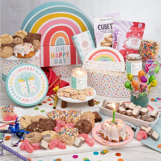 Wow! What a fantastic Birthday Celebration! When you can't be there in person, the "Oh Happy Day!" Birthday Bonanza Gift Set is definitely the gift to send that will let someone know you wish you could have been.  Bursting with Happy Birthday wishes, this fun gift box is full of delicious candies, cookies, mini bundt cakes, rainbow napkins, and a Happy Day candle!