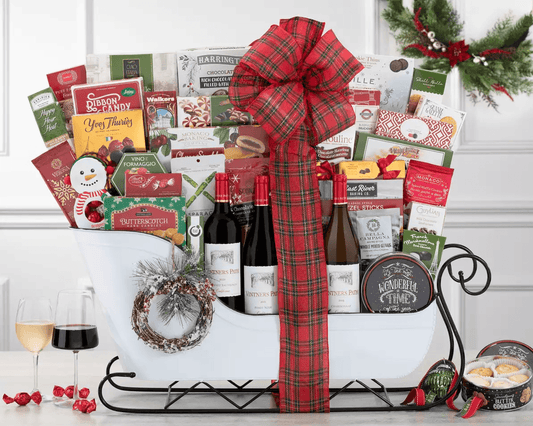 This massive Santa's Ultimate Wine Sleigh Gift Set with three wines from California's Vintner's Path an impressive collection of sweet and salty snacks.   Cabernet, pinot noir and chardonnay are surrounded by dark chocolate peppermint truffles, butter cookies, candy cane almonds, Lindt and Godiva milk chocolate truffles, crackers, smoked Gouda cheese spread