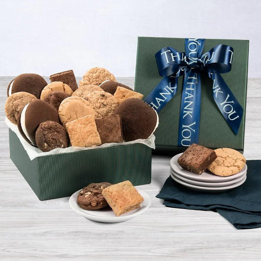 There are so many ways to say thank you, but the sweetest way is with our Thanking You With Sweets Bakery Gift Box. In a sophisticated green gift box are two brownie flavors, four cookie flavors, and four classic chocolate with vanilla cream whoopie pies. A total of 16 baked goods in this gift! 