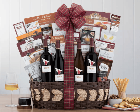 This gift basket is the perfect compliment to a Thanksgiving dinner with family and friends, as well as New Years and Christmas.  This gift collection contains four celebrated wines from California's Sonoma County.  Talaria Vineyards Russian River chardonnay with apple and pear flavors, bold red cuvee, Sonoma Carneros pinot noir and a complex cabernet are brought together for this exclusive quartet.