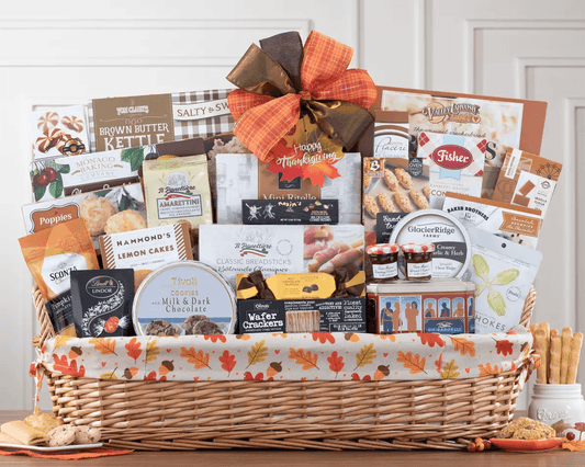 Thanksgiving Ultimate Impression Gift Basket - Enticing and easy to give, this gift basket is piled high with Ghirardelli dark chocolate wafers, Godiva milk chocolate truffles, lemon cakes, Socado tiramisu milk chocolate truffles, Bonne Maman strawberry preserves, sesame crackers, kettle corn popcorn, vanilla fudge with sea salt, Fisher Original Fair scone and shortcake mix, pumpkin spice chocolate almonds and much more.