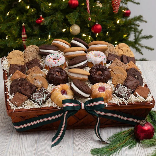 Indulge in the joy and deliciousness of our delightful Ultimate Cookies and Brownies Gift Basket!  This scrumptious assortment is perfect for celebrating the holidays and any special occasions. Inside you'll find an array of mouthwatering treats like the ideal sweet treat whoopie pies, light and fluffy mini bundt cakes, decadent brownies, delectable blondies, and crave-worthy cookies.