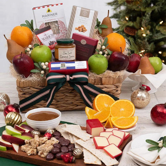 Among our beautiful oranges, crisp apples, and juicy pears, this Winter Cheer Fruit Gift Basket boasts a generous offering of other delicious treats, including Vermont sharp cheddar cheese and exquisite Maine-made sea salt caramel dipping sauce. A sensational holiday gift unlike any other.