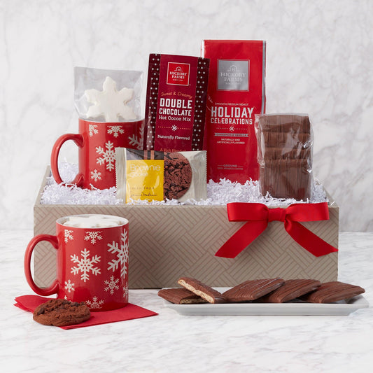 Winter Warmup Coffee and Cocoa Gift Box - Anyone with a sweet tooth will love to unwrap this holiday gift box! Tucked inside they'll find chocolate grahams, cookies, hot cocoa mix, marshmallows, and coffee for the perfect winter warmup. They'll love to sip from the included mug all season long! 